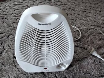 Teplovzdušný ventilátor.