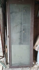Kovové prosklené venkovní dveře 2ks (2 křídla)