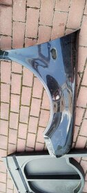 Pravý přední blatník VW Bora černá metalíza LC9Z