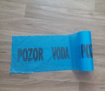 Folie s nápisem Pozor voda š.300 m - 1