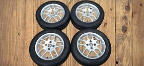 ALU 14" 4x100 ET38 s celoročními pneu 185/60/14