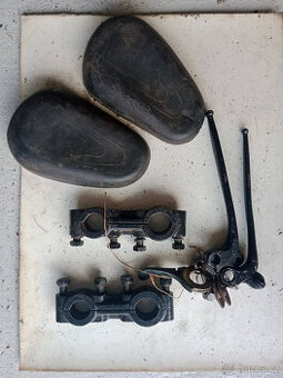 Páčky, nákolenice, úchyty na moto