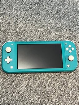 Prodám Nintendo Switch Lite (modra) + pouzdro + hry