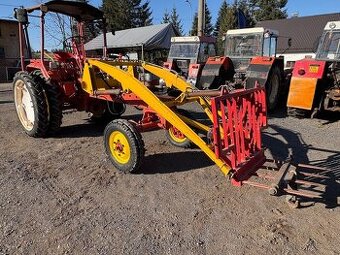 Traktor RS 09 GT 124 s čelním nakladačem atd.