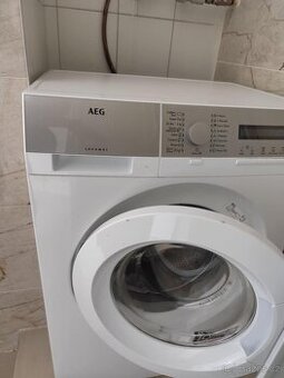 Plne funkcni pracka AEG L76270SL