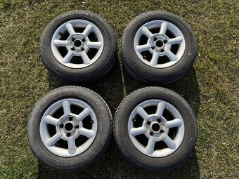 Sada letních pneu s alu disky Borbet na Škoda Felicia