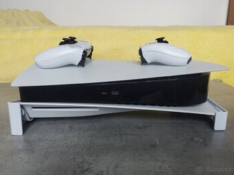 PlayStation 5 s mechanikou + hry PS4/PS5