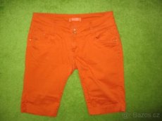 Oranžové capri kalhoty