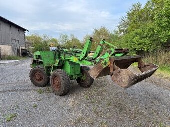 Čelní nakladač Kramer 411 4x4
