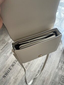 Kabelka  nova bila smetana , kožená