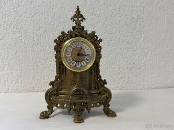 Stolní hodiny zdobená masivní litá mosaz
