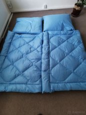 Perove deky a polštáře