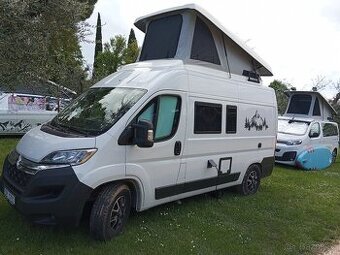 Obytná dodávka CLEVER VANS TOUR 540 se stanovou střechou