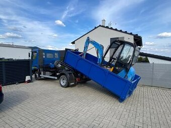 Iveco 75E13 kontejner a JCB 8015 ja