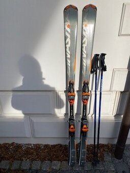 Lyže Dynastar 170cm, hůlky 132cm, přílba,brýle
