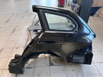 Čtvrtka (levá zadní blatník) BMW E91