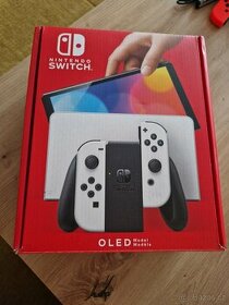 Zánovní Nintendo Switch OLED top stav