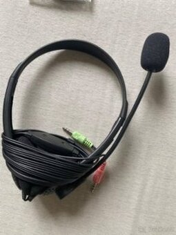 Sluchátka s mikrofonem zánovní.