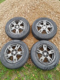 Zimní pneu 215/65R16 na hliníkových discích rozteč 5x112