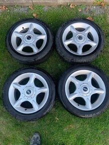 Sada alu disků s pneu originál Mini Cooper