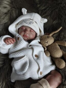 Pletený kabátek s oušky