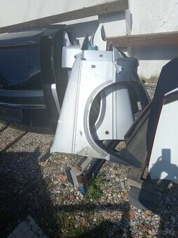 Chrysler Voyager 2 přední blatníky a vyko kufru