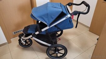 Thule Urban Glide 2 (2023) s korbičkou.