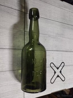 Stara láhev od piva značená