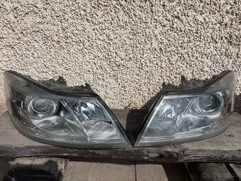 Světla Škoda Octavia 2 Facelift H7 + H1 čočka