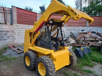 smykový nakladač KOMATSU SK 09