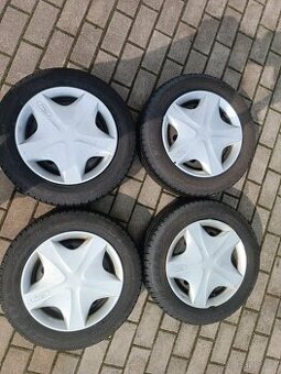 325. Plechové disky s pneu Ford Fiesta 4x108 R13