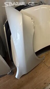 Pravý blatník Škoda Octavia 2 stříbrný