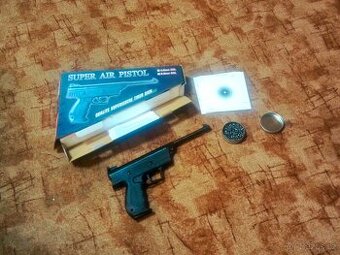 Lámací vzduchová jednoruční pistole ráže 5,5mm plus terče  a