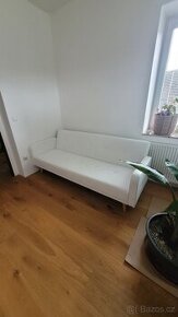 Bílá rozkládací sedacka Regor