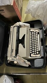 Kufříkový psací stroj