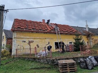 Pracovník na střechách