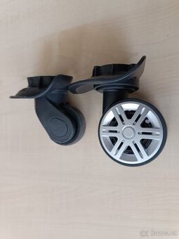 Nová kolečka na cestovní kufr,