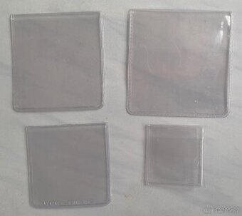 Směs 150 ks PVC kapsiček na mince