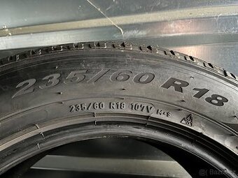 235/60 R18 107V