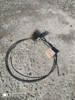 Kominický kartáč se sedmimetrovým nástavcem.