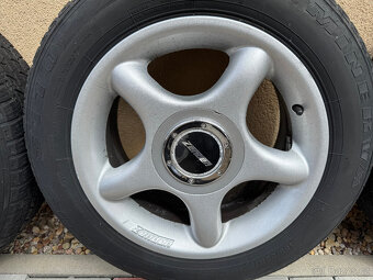 Alu kola Zender 15" 4x100, 7Jx15 ET35, zimní pneu 185/65/15