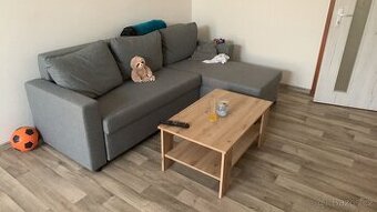 Šedá rohová sedačka