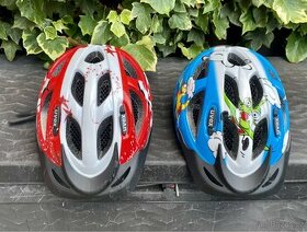 2x Dětská cyklistická přilba Uvex - modrá a červená