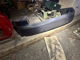 VW Golf 4 Náhradní díly - Zadní nárazník 1J9807421