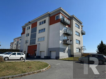 Prodej bytu 3+kk+B, 108 m2 s venkovním parkovacím stáním v P