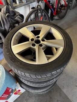Alu kola 5x100 Rapid Skoda s pneu Dunlop215/45/16