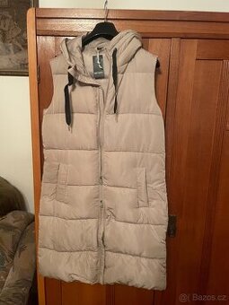 Dámska prošívaná dlouhá vesta- nová