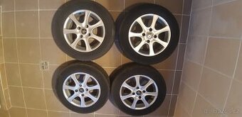 Prodám sadu letních kol na alu discích Peugeot