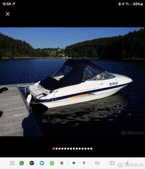 Motorová loď Bayliner 602 Capri + přívěs.