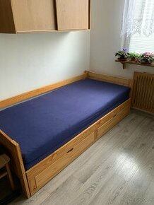 Rozkládací postel s úložným prostorem